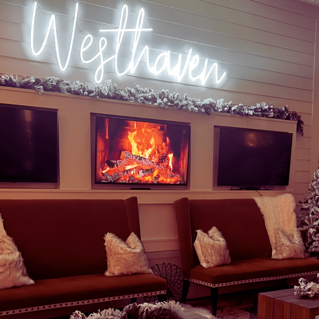 Modernes Neonschild in weiss für einen gemütlichen Wartebereich und Lounges