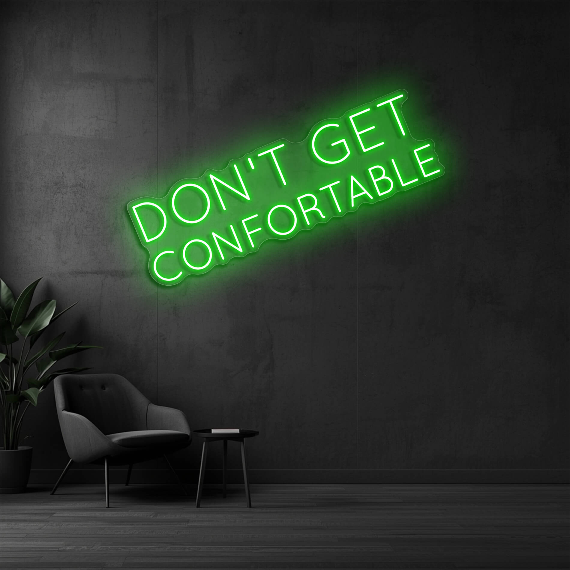 LED Neon Schriftzug Don't Get Comfortable in gruen für moderne Büroräume