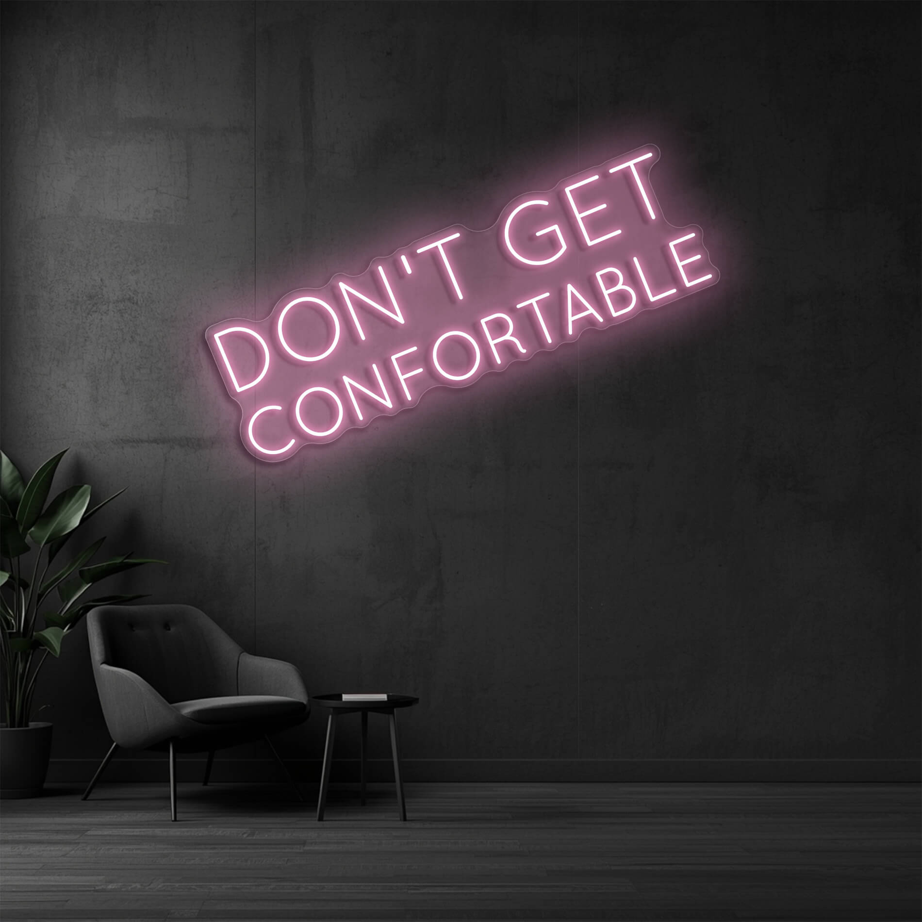 Neon Motivationsspruch Don't Get Comfortable in light-pink für Trainingsräume